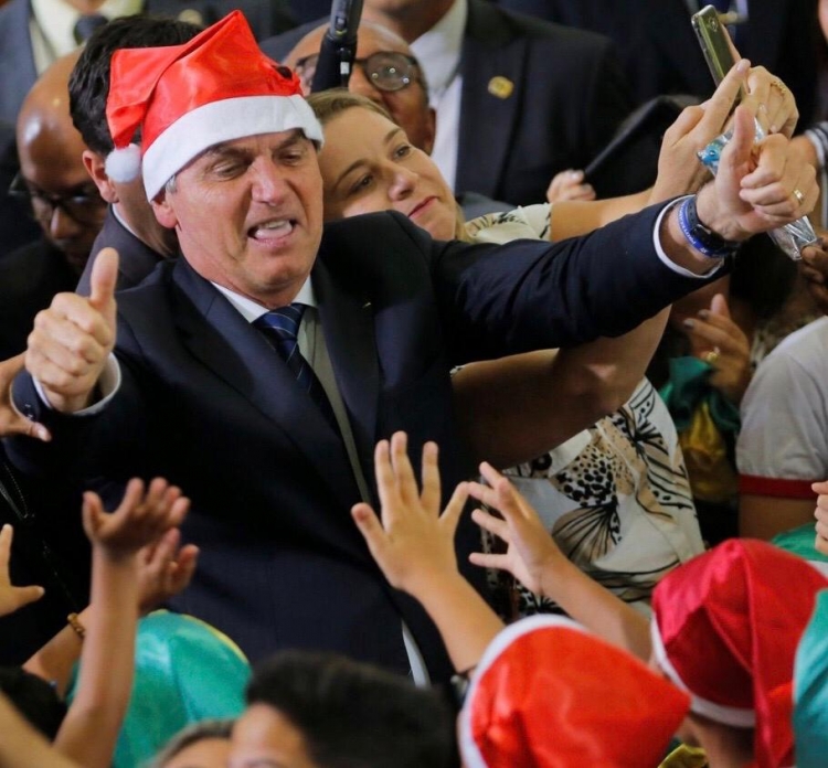 O presidente Jair Bolsonaro durantes atividade com crianças em Brasília
